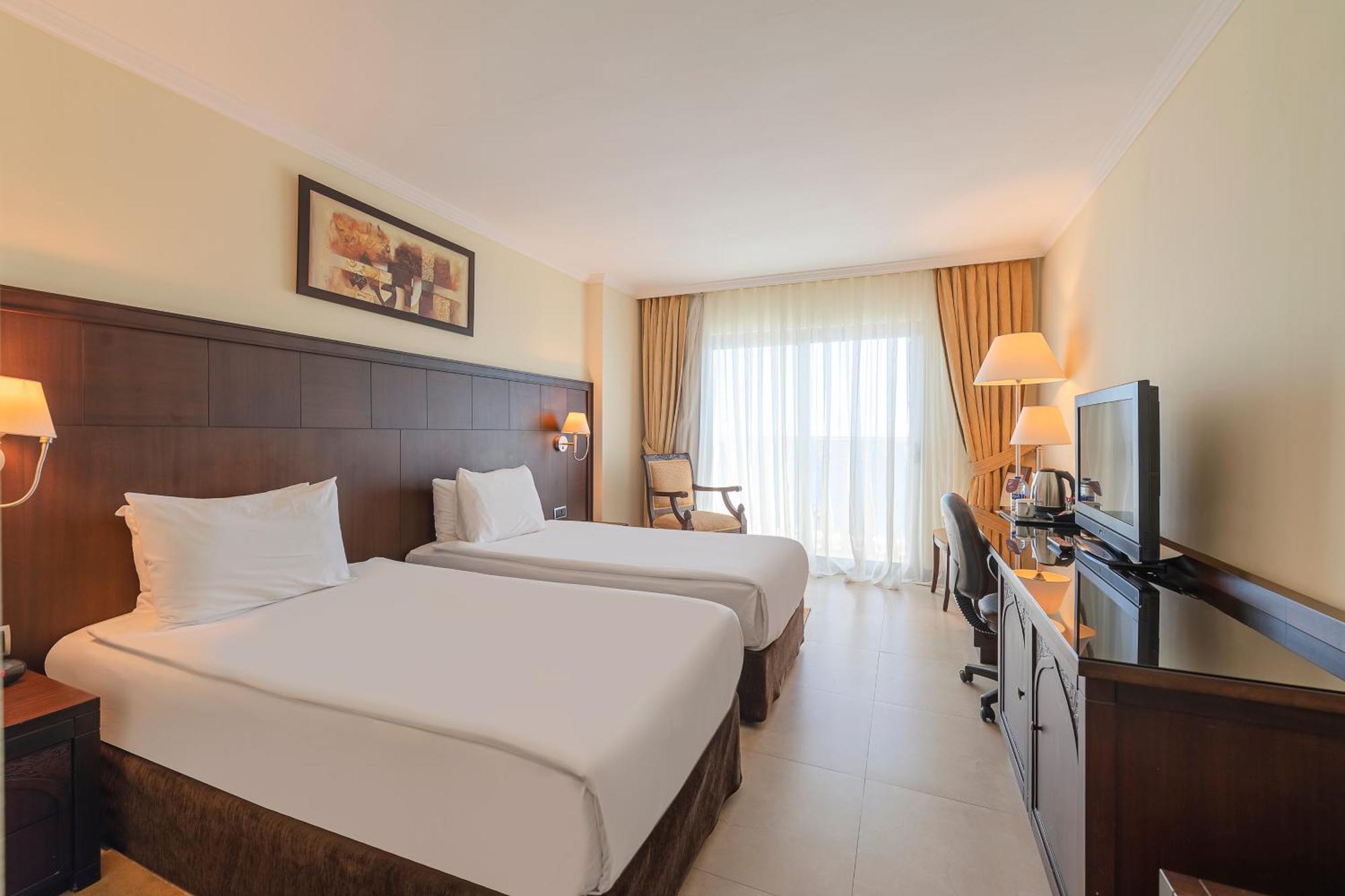 Standaard Kamer met 2 Eenpersoonsbedden aan Zee