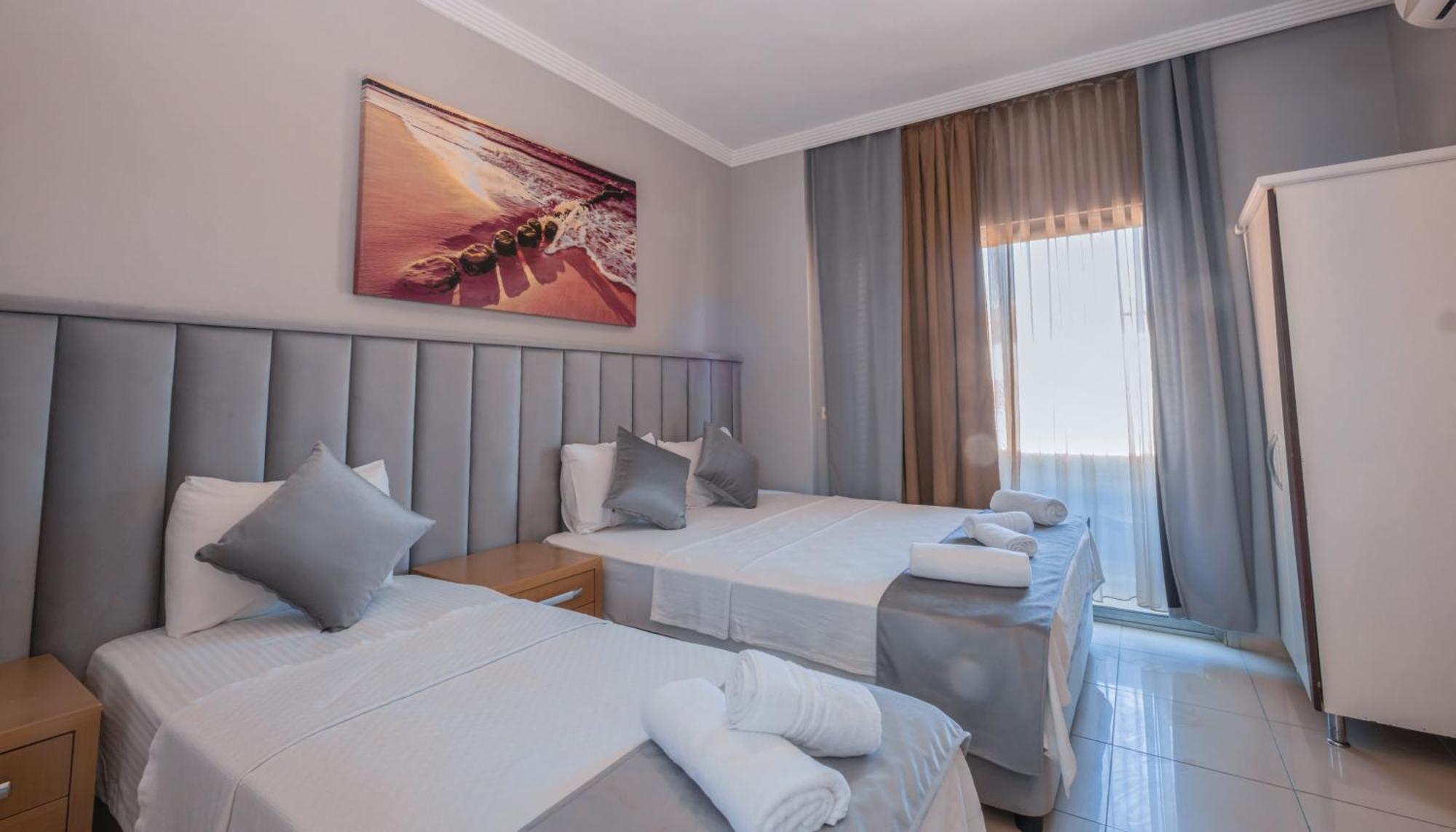 Chambre Triple avec Balcon