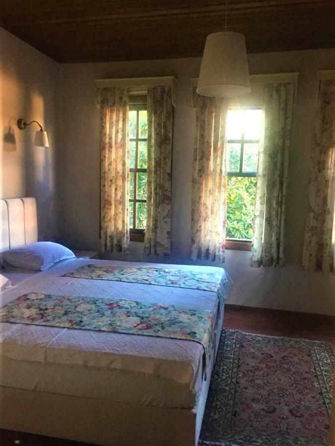 Camera Familiare con Vista Giardino